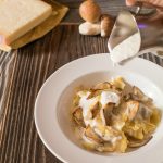 Ravioli con fonduta di Asiago e porcini